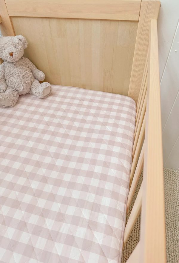 luxe quilted waterproof cot sheet & mattress protector | blush gingham | bambella